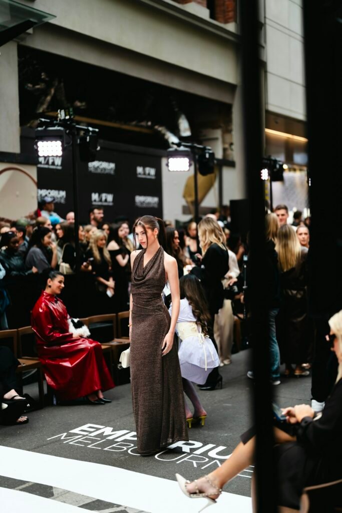 Model walking past the front row at a fashion show