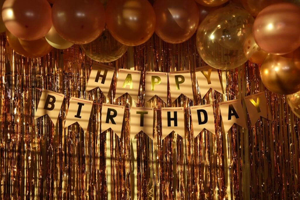 Gold birthday bunting and balloons