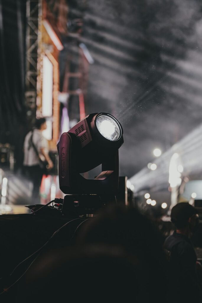 Moving-head stage light during a live show